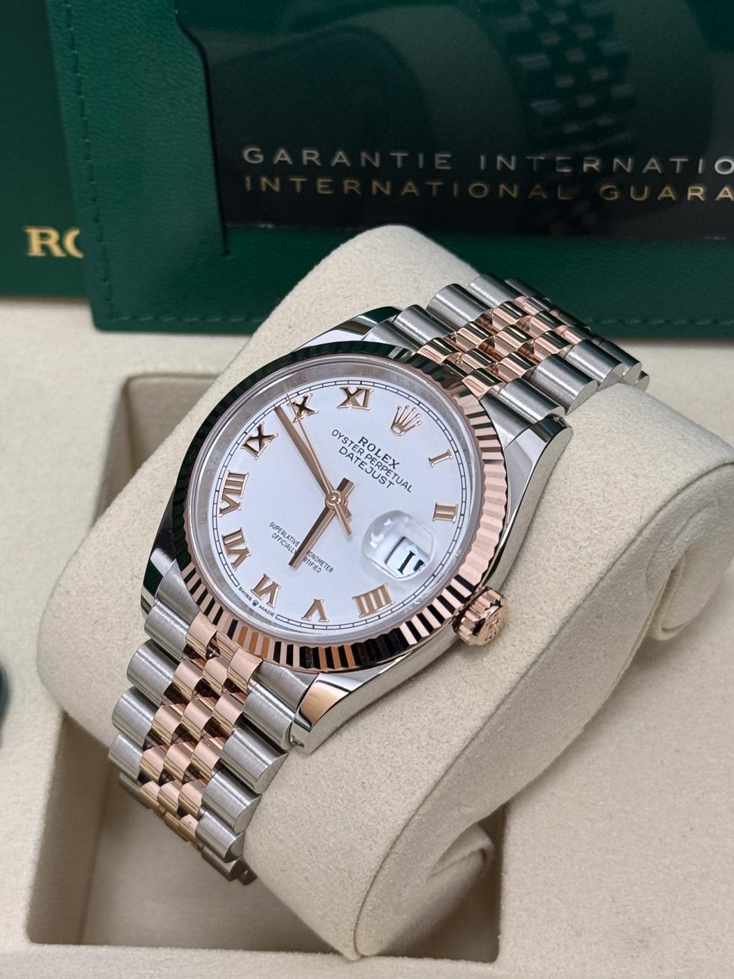 Rolex Datejust 36mm Two-Tone Everose Gold White Roman Dial Fluted Bezel Jubilee