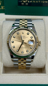 Rolex Datejust 36mm Two-Tone Yellow Gold Fluted Bezel Champagne Diamond Dial Jubilee - 126233 - New 2025