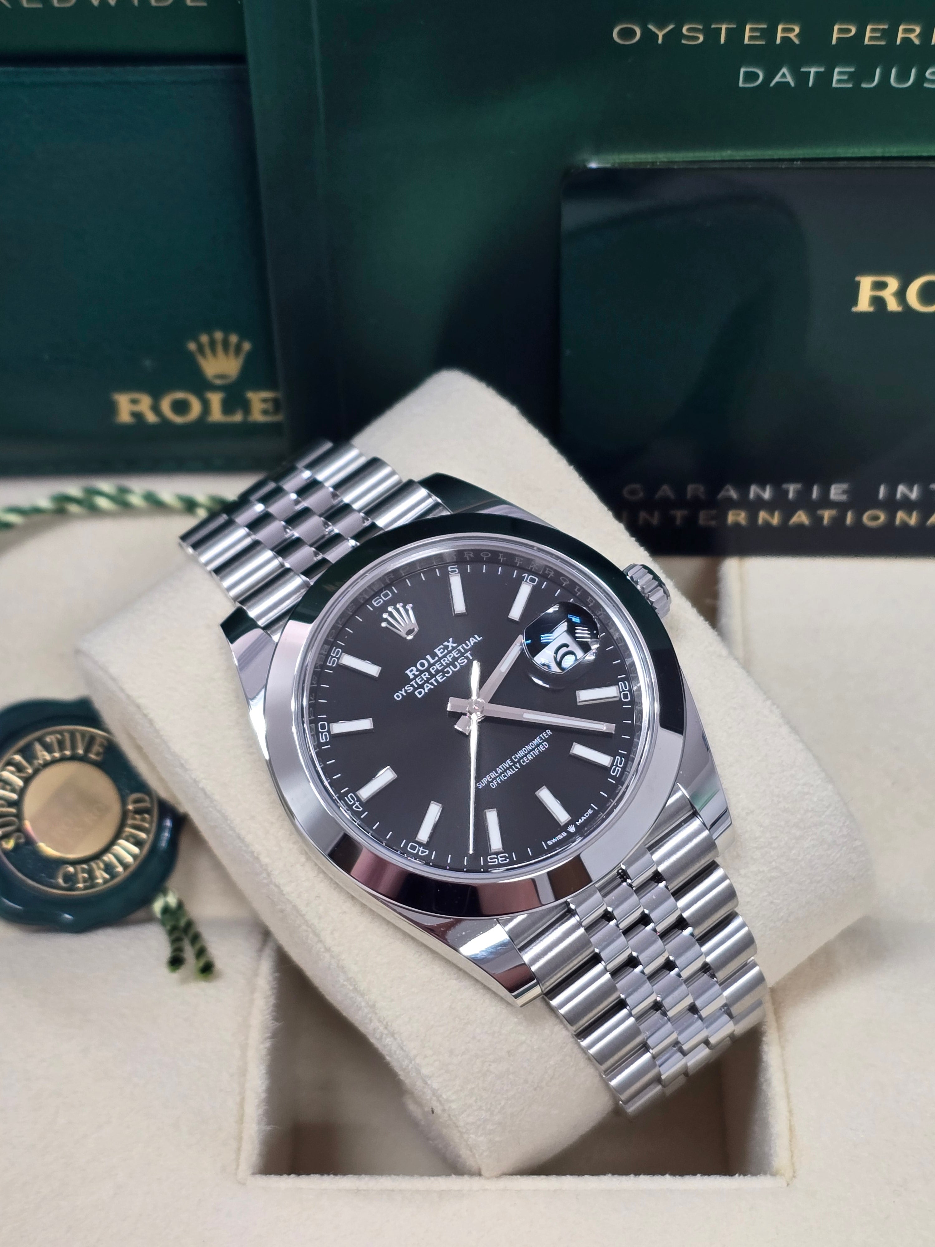 Rolex Datejust 41mm Black Index Dial Smooth Bezel Jubilee Bracelet 126300 – New