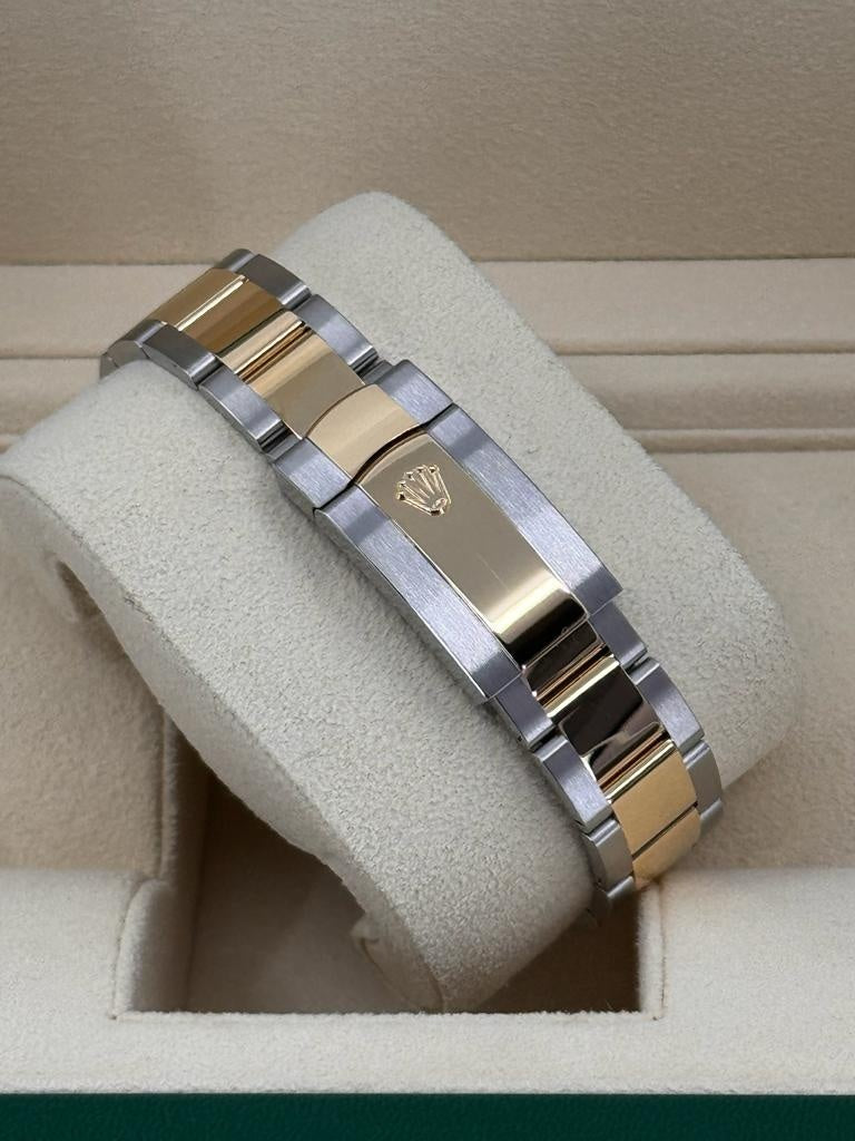 Rolex Datejust 41mm Two-Tone Yellow Gold Black Diamond Dial Fluted Bezel Oyster