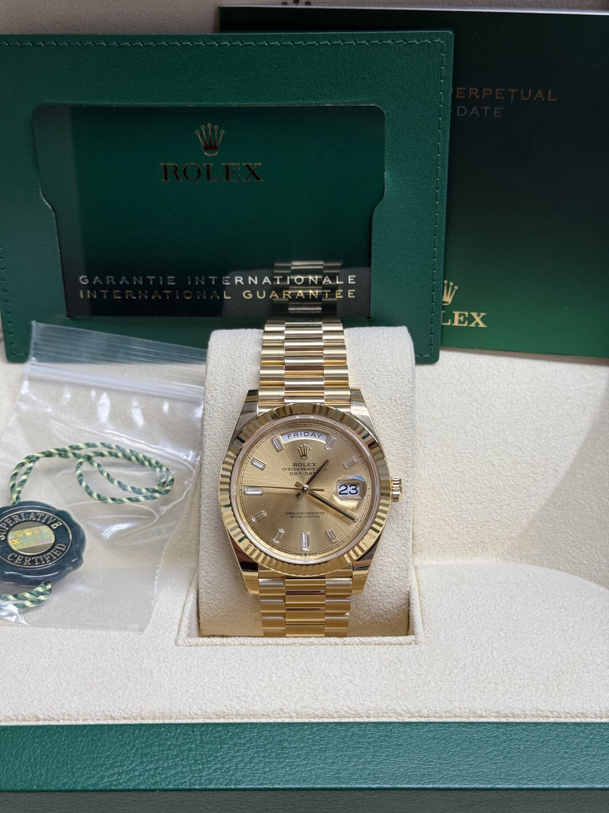 Rolex Day-Date "President" 40mm Yellow Gold Champagne Diamond Baguette Dial