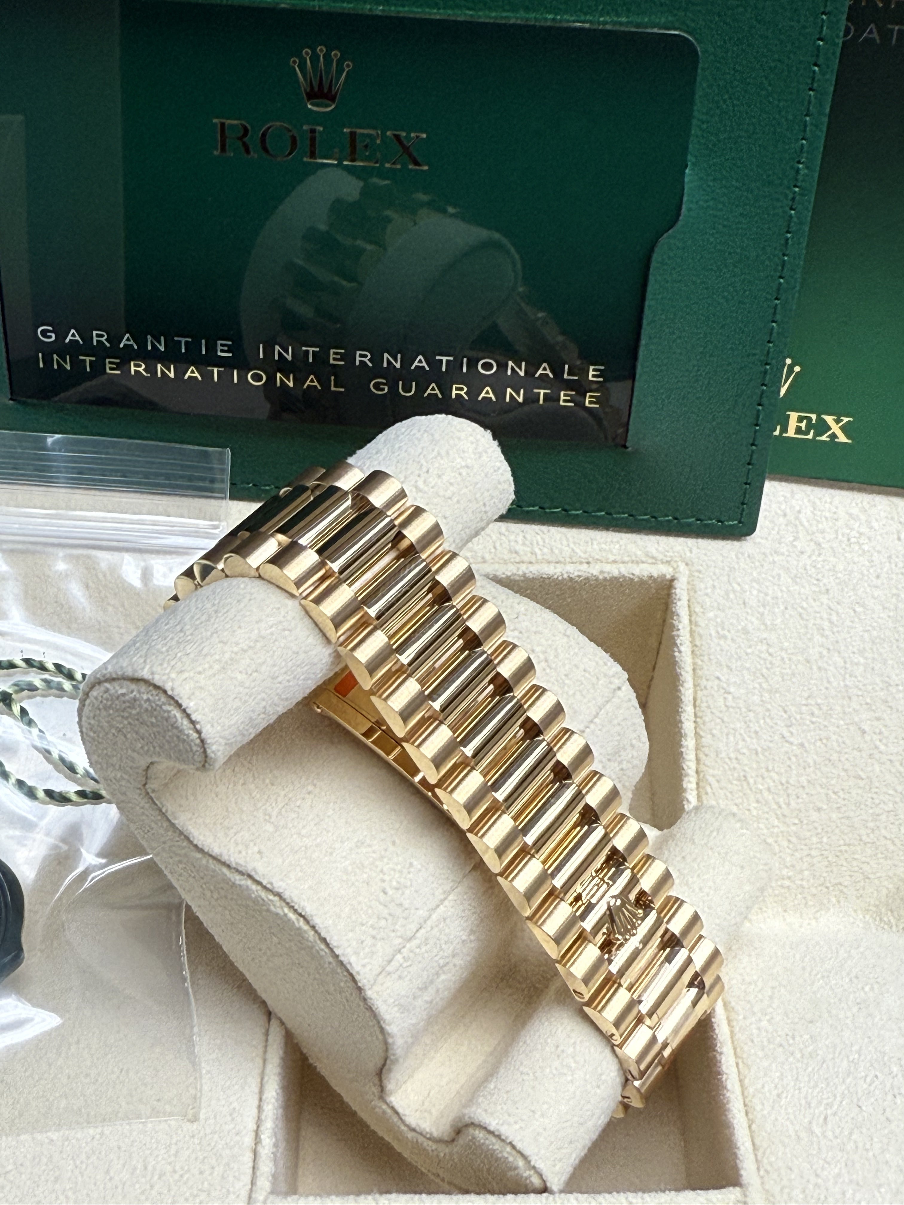 Rolex Day-Date "President" 40mm Yellow Gold Champagne Diamond Baguette Dial