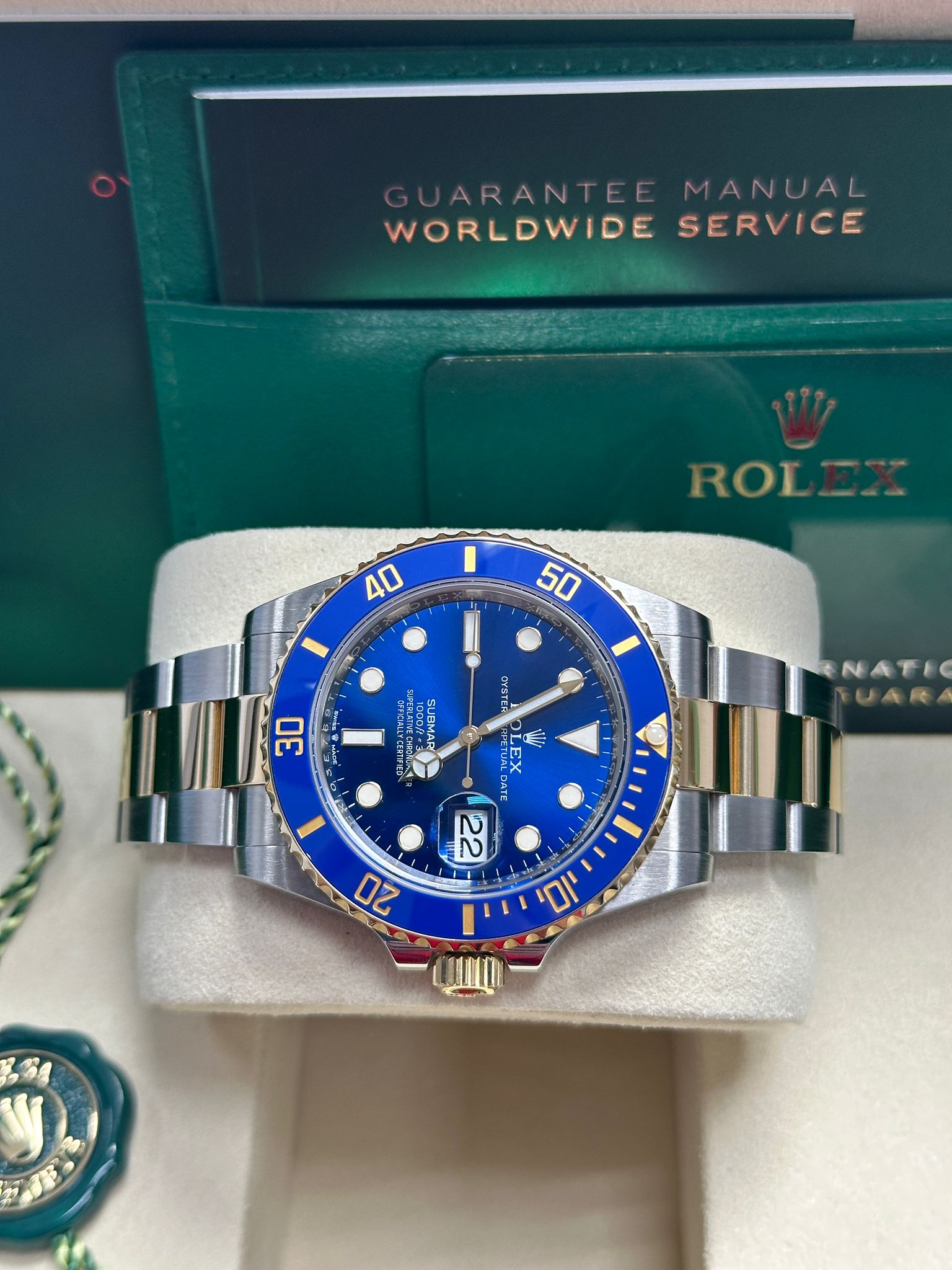 Side Profile of Rolex Submariner 126613LB Showing Blue Bezel and Case Detail in Two-Tone Steel and Gold