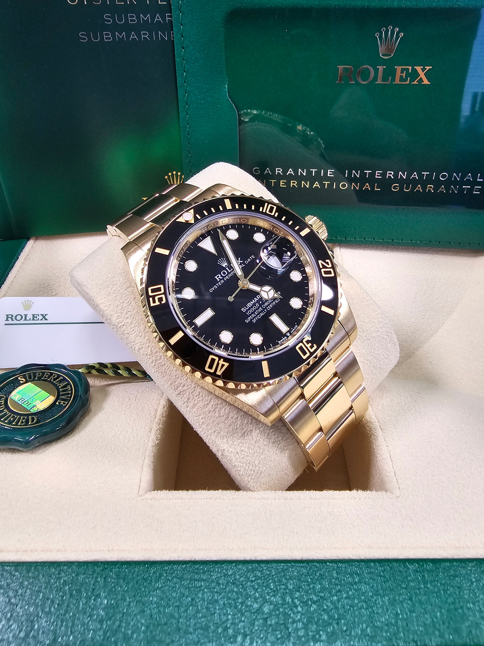 Gold rolex submariner black face best sale