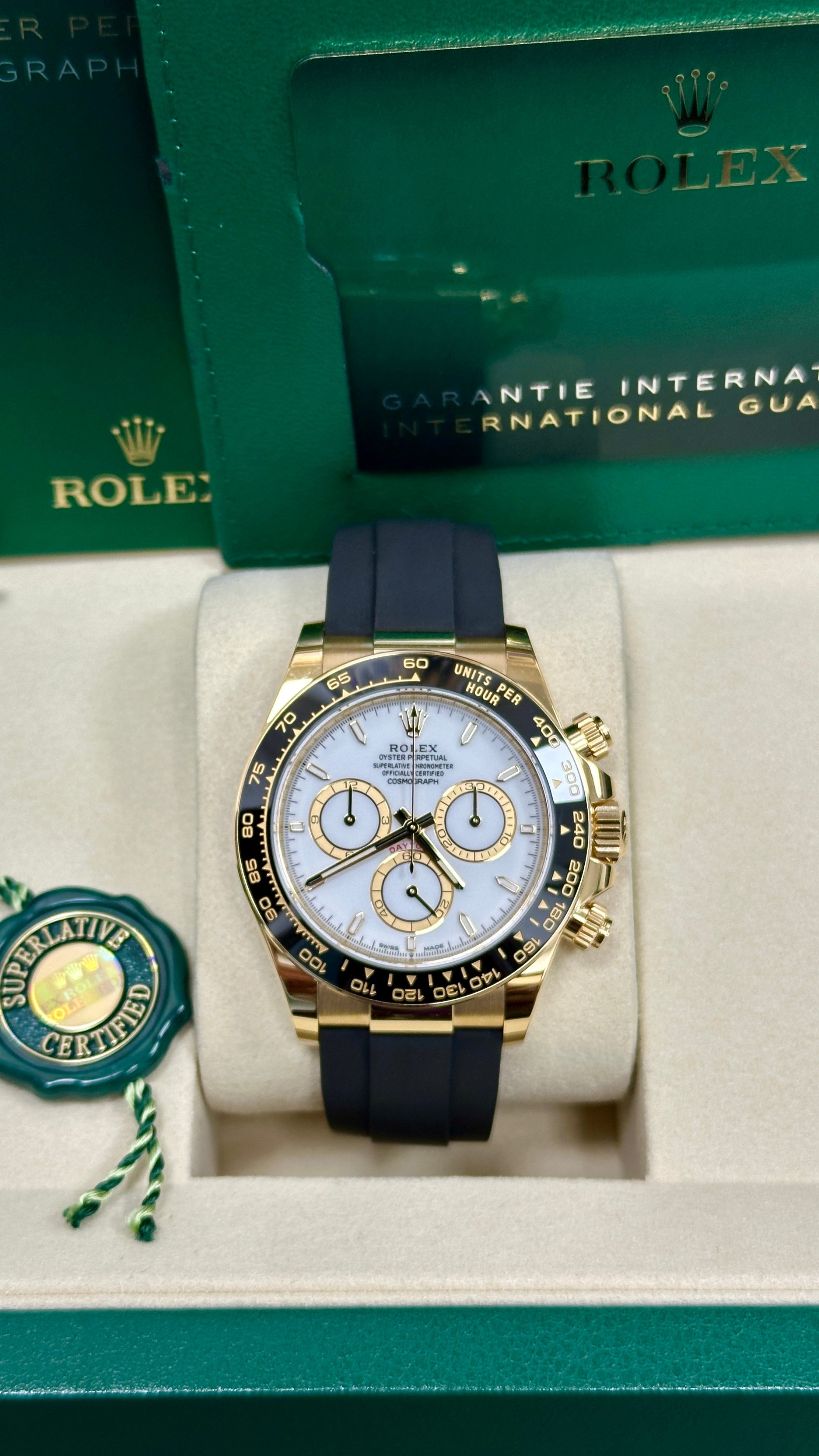 Rolex Cosmograph Daytona 40mm Yellow Gold White Dial Black Ceramic Bezel