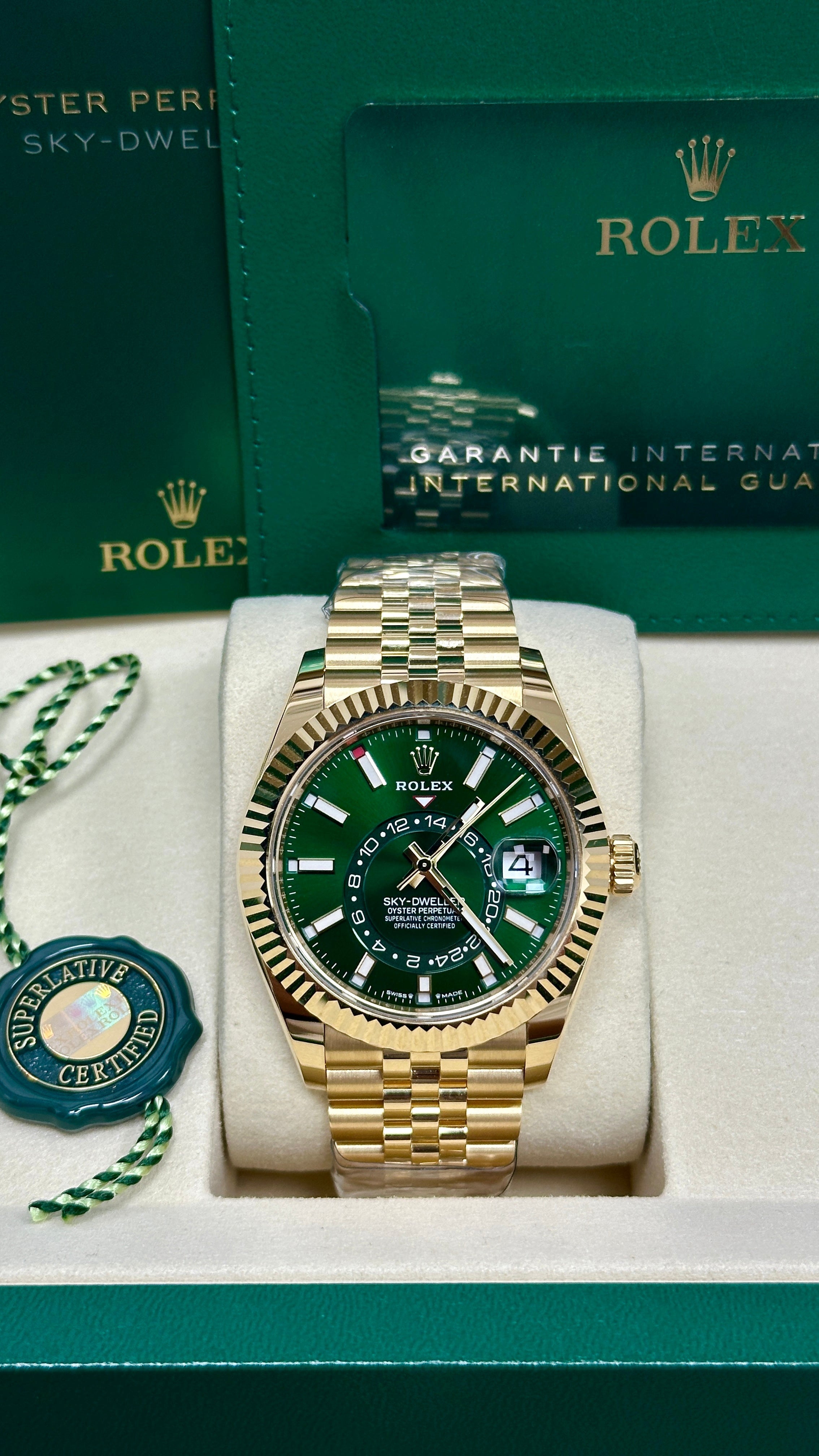 Rolex Sky-Dweller 42mm Yellow Gold Bright Green Dial Jubilee Bracelet