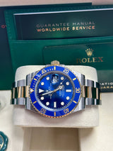 Side Profile of Rolex Submariner 126613LB Showing Blue Bezel Case Detail in Two-Tone Steel and Gold
