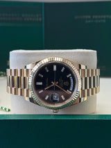 Rolex Yellow Gold President Day Date 40mm Black Diamond Baguette Dial - 228238 - New 2025
